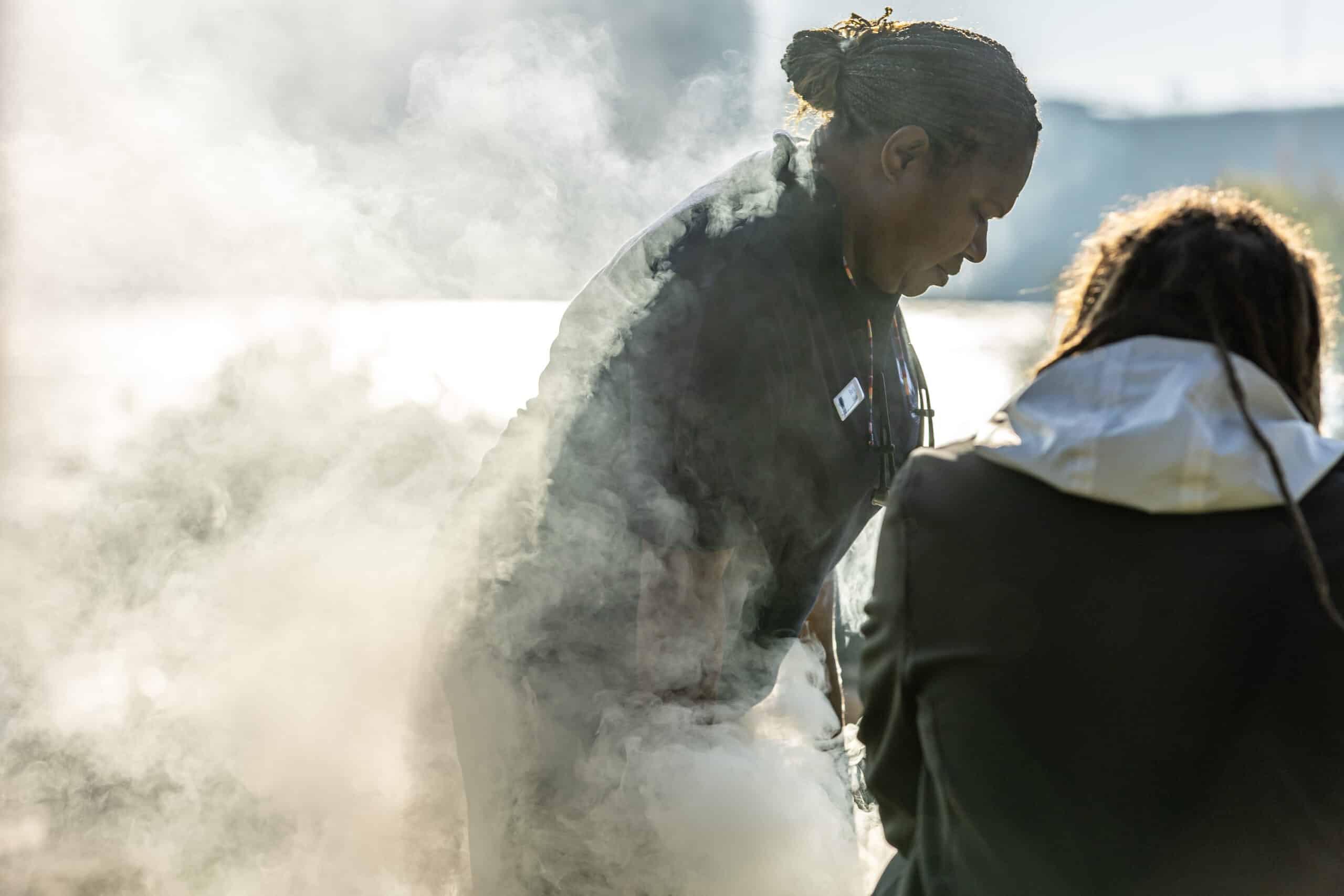 First Nations woman at smoke ceremony